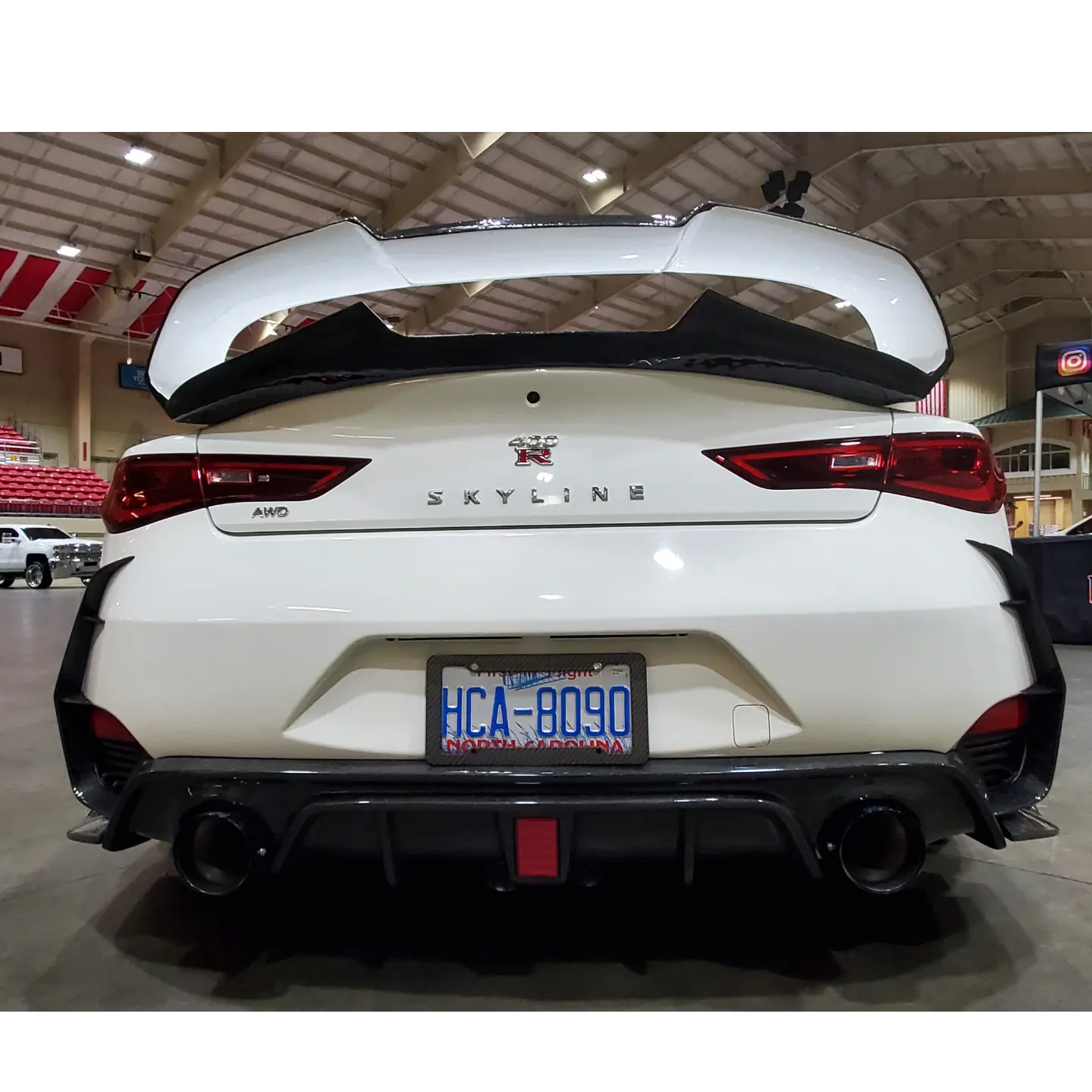 Infiniti Q60 Honeycomb Carbon fiber rear diffuser and wing splatter guard.